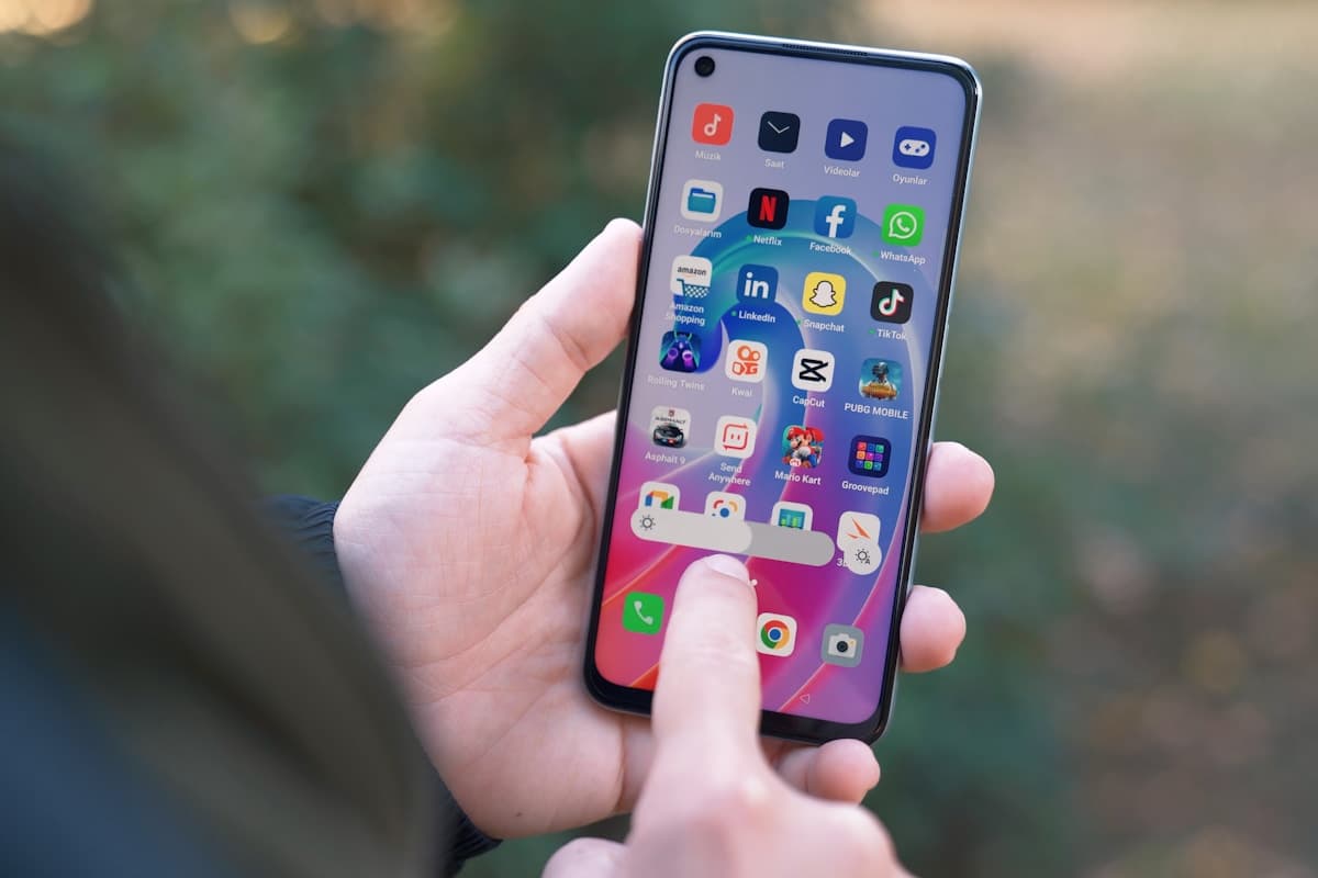 Hand holding an Android smartphone