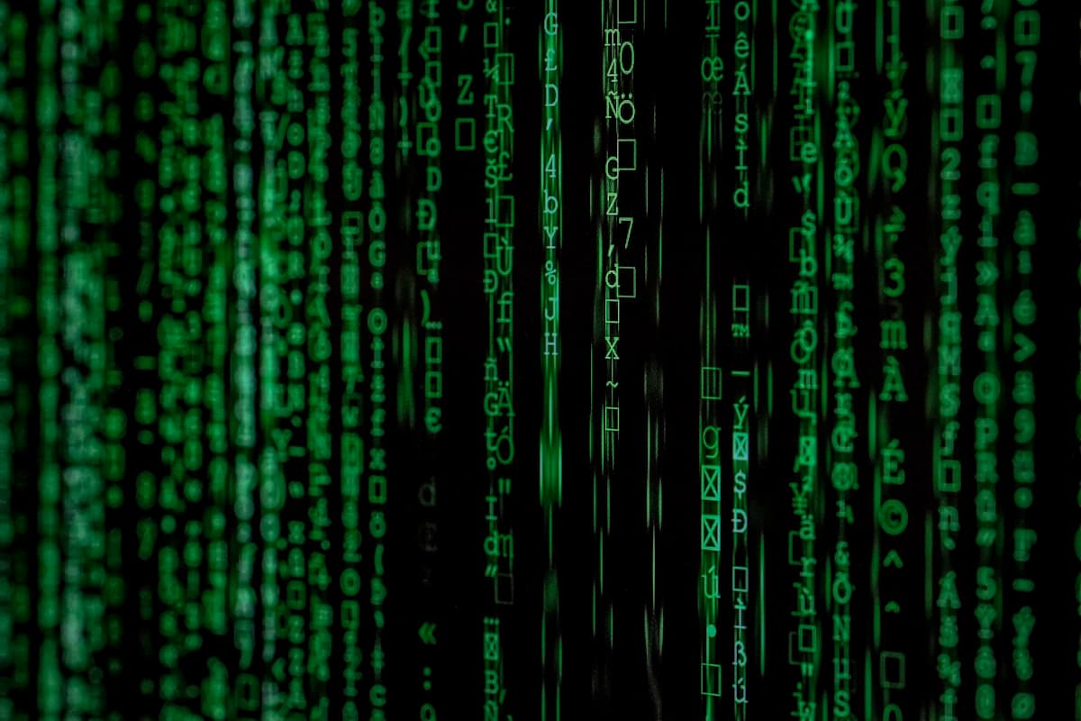 Cascading green code on dark screen