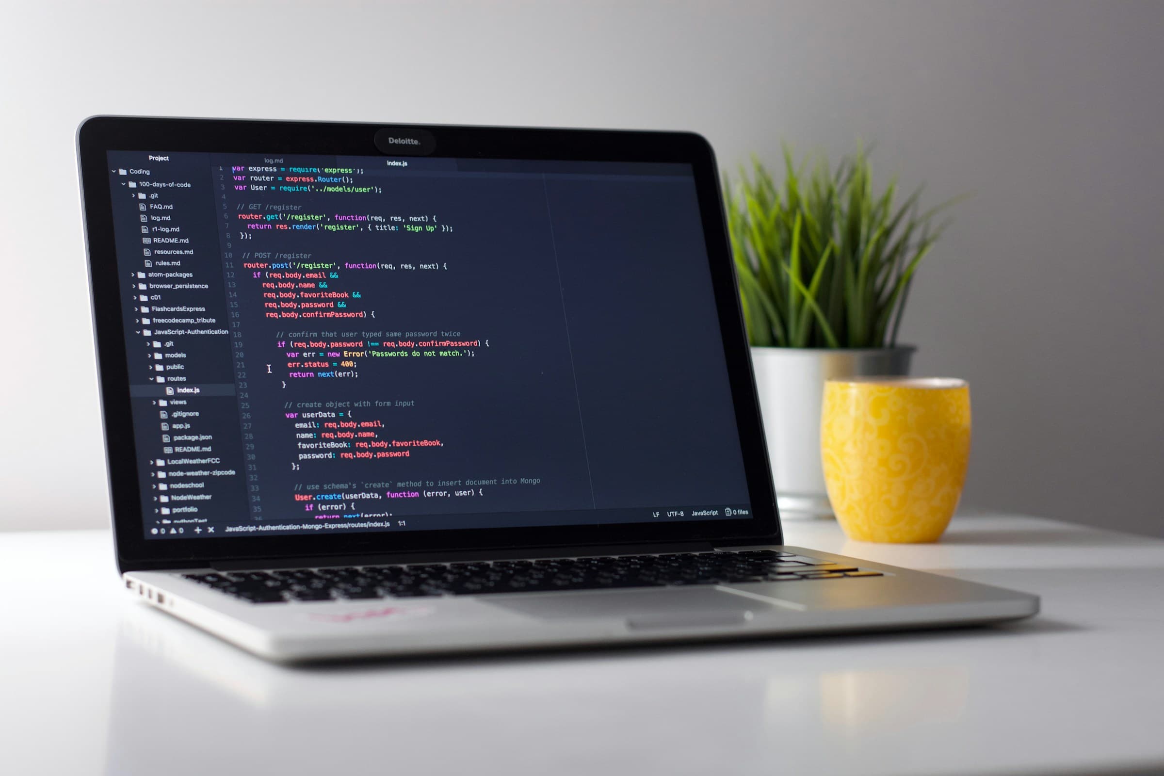 Developer working at an iMac
