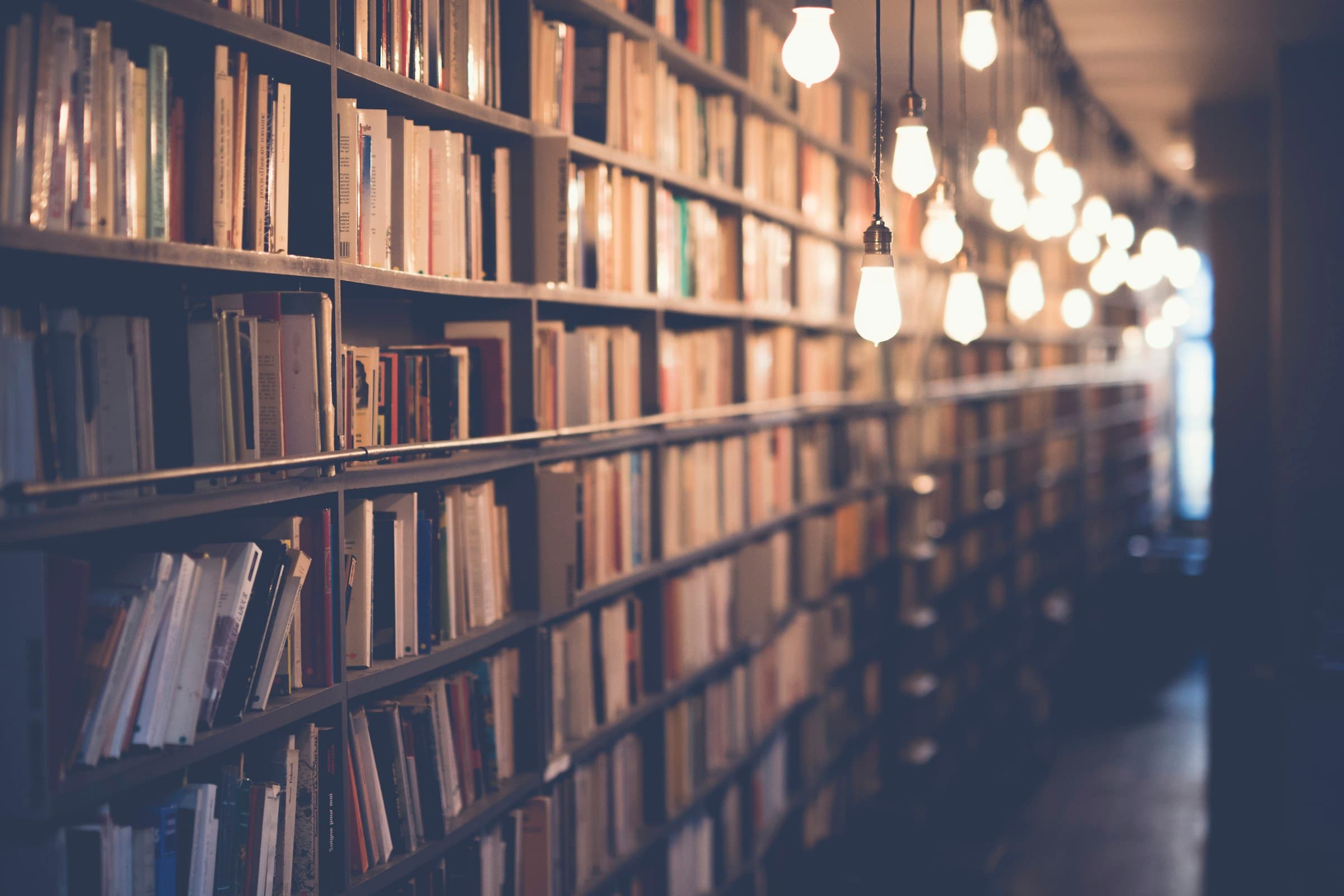 Stack of programming books for learning