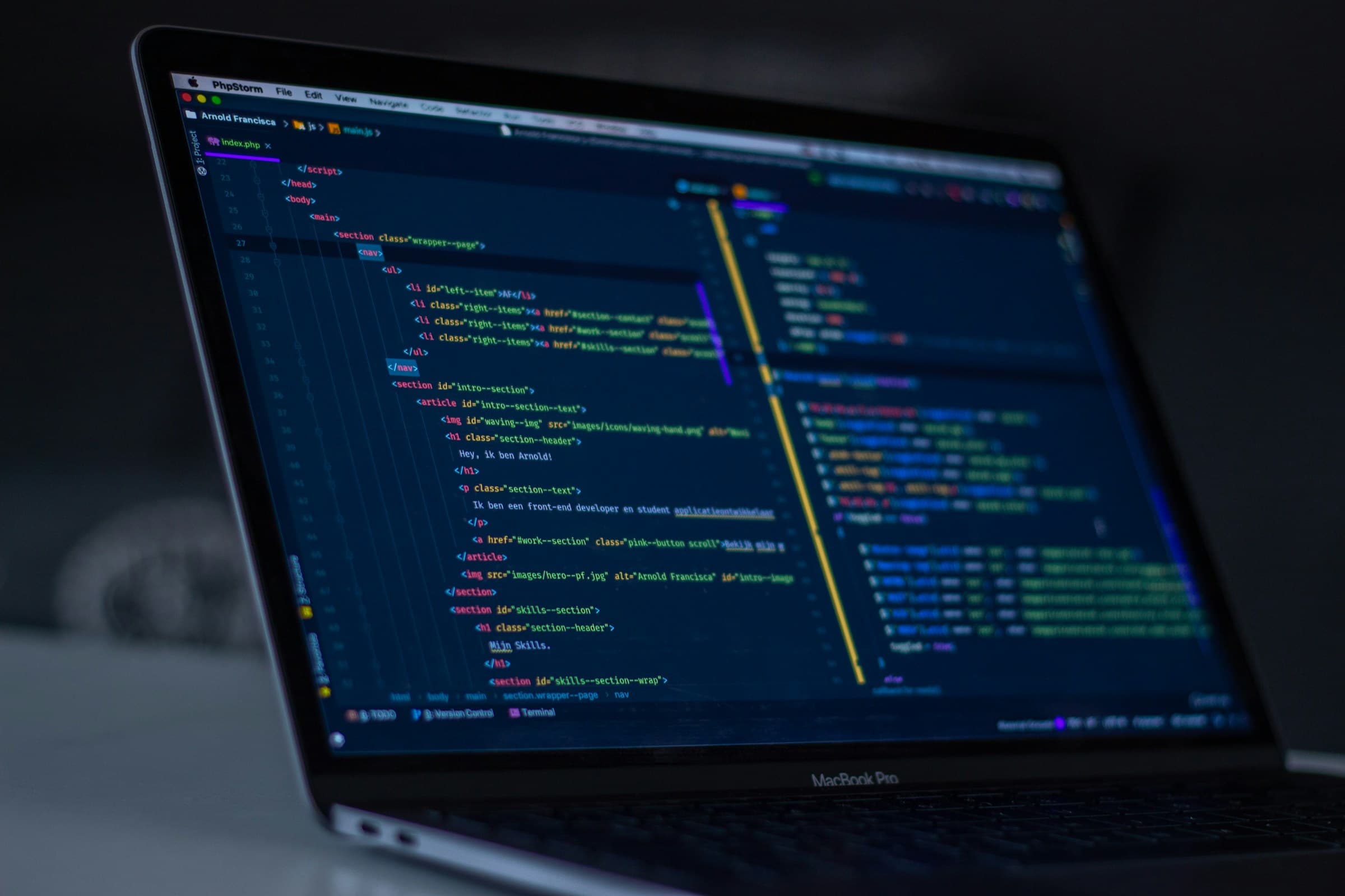MacBook Pro displaying lines of programming code